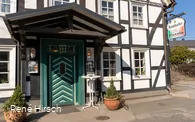 Eingang Pizzeria Piccola in Welschen Ennest