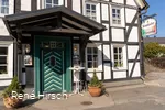 Eingang Pizzeria Piccola in Welschen Ennest